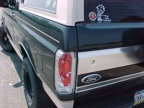 1993 Ford Bronco - Rear view of a 1993 Ford Bronco showing its distinctive body style and badging.
