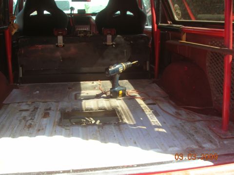 1985 Ford Bronco - shot of floor with fuel pump access door removed
