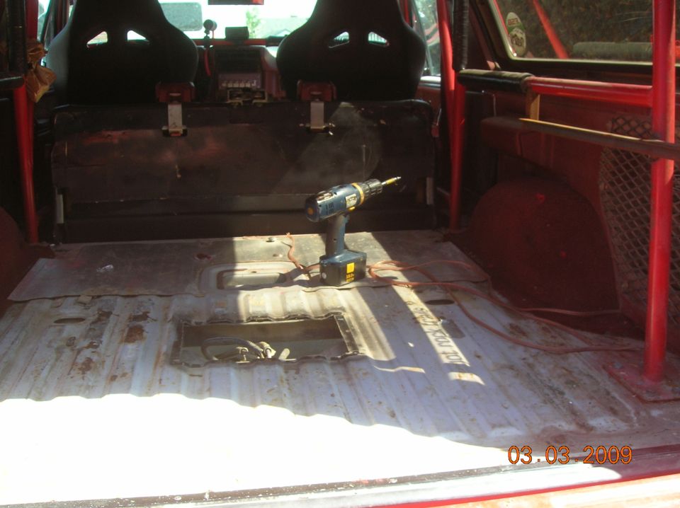 shot of floor with fuel pump access door removed