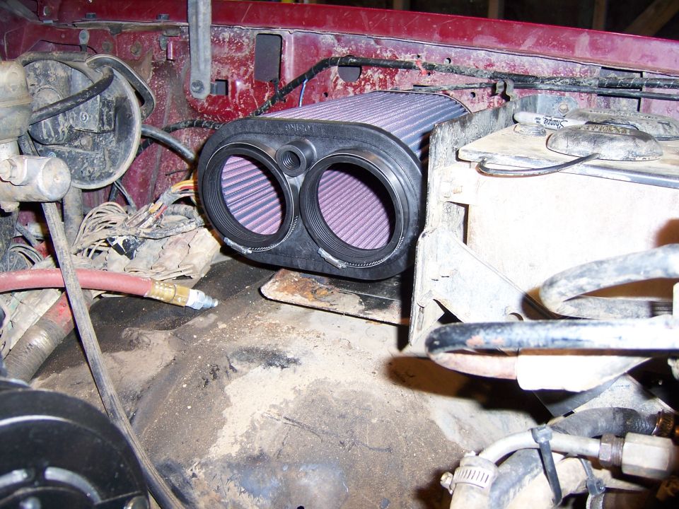 Engine bay showing a K&N dual intake air filter assembly mounted near the battery