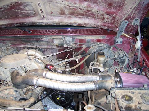1991 Ford Bronco - Custom engine modifications are visible in this engine bay, including a K&N air filter and dual intake hoses.