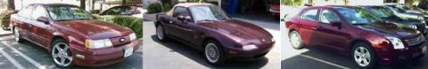 1989 Ford Taurus - Front view of a maroon 1989 Ford Taurus sedan parked in a lot.