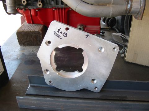 1993 Ford Taurus - A custom metal adapter plate is shown with handwritten measurements and directional markings.