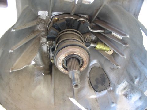 1993 Ford Taurus - Close-up view of a clutch release bearing and input shaft assembly within a transmission housing.