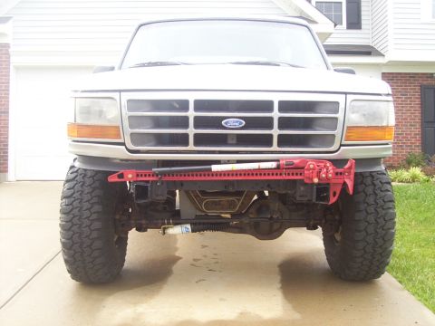 1995 Ford Bronco - The 48" Hi-Lift fits perfectly on the front frame rails.