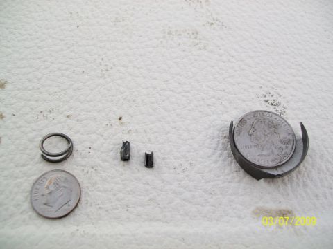 1972 Ford Ranchero - Small engine components, including a spring and clips, are shown with a dime and a quarter for scale. The date 03/07/2009 is visible.
