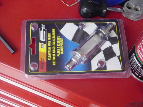 1982 Ford Bronco - A clearview fuel filter is shown in its original packaging, ready for installation.
