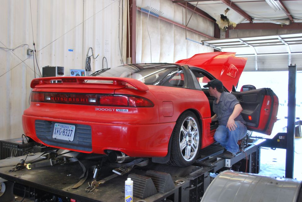 Red 1991 Mitsubishi 3000GT VR-4 rear view on dynamometer