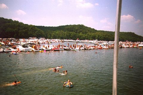 1982 Ford Bronco - A crowded lake scene with numerous boats and people enjoying the water.