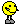 1979 Ford Bronco - A low-resolution image depicts a yellow smiley face wearing sunglasses and standing on two legs against a black background.