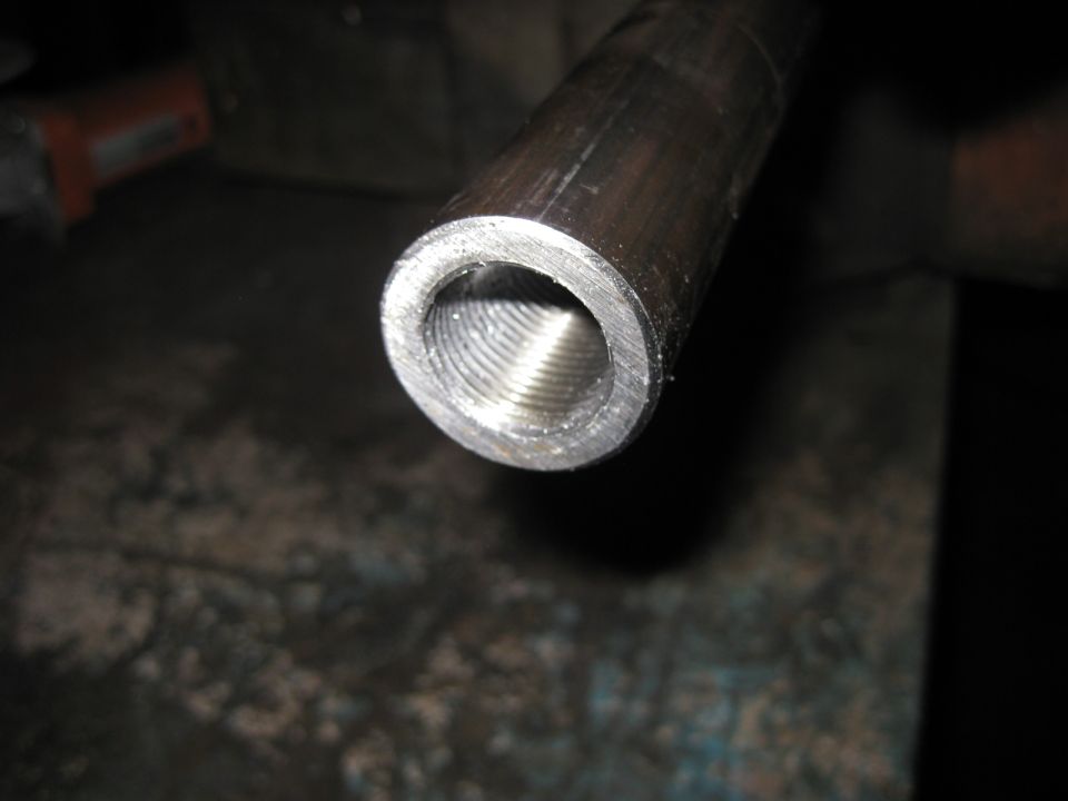 Close-up of threaded metal pipe interior
