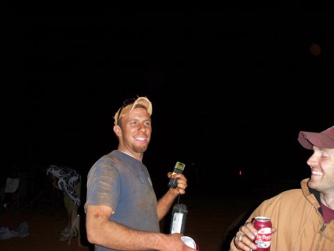 1996 Ford Bronco - Two men are seen outdoors at night, one holding a device and a can, while the other smiles and holds a Dr. Pepper can.