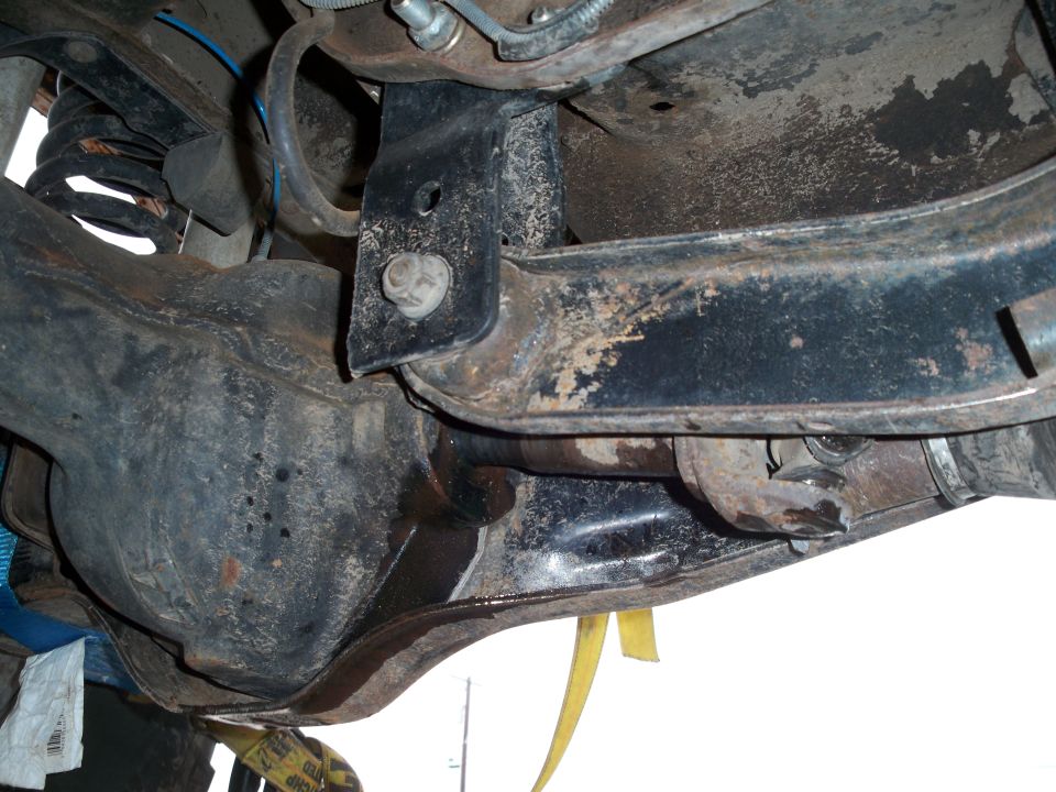Rear axle and suspension components of a vehicle