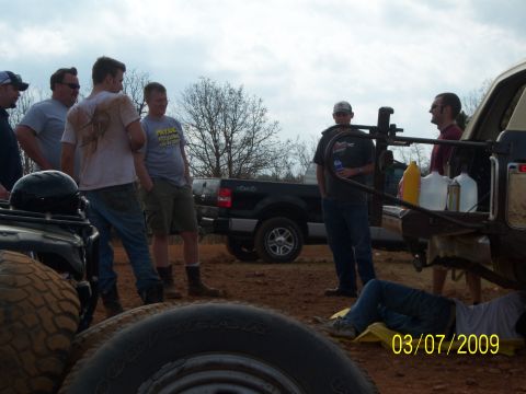 1996 Ford Bronco - People gathered around vehicles at an outdoor event, with a date stamp of March 7, 2009.