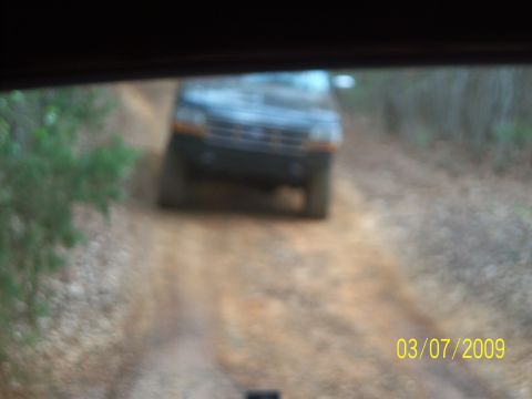1996 Ford Bronco - A 1996 Ford Bronco is seen driving on a dirt road, with a date stamp of 03/07/2009 visible.