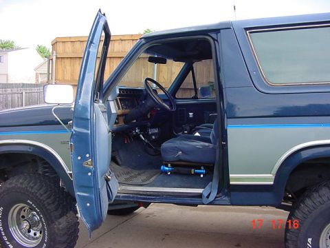 1986 Ford Bronco - Drivers side, flashlight mounted