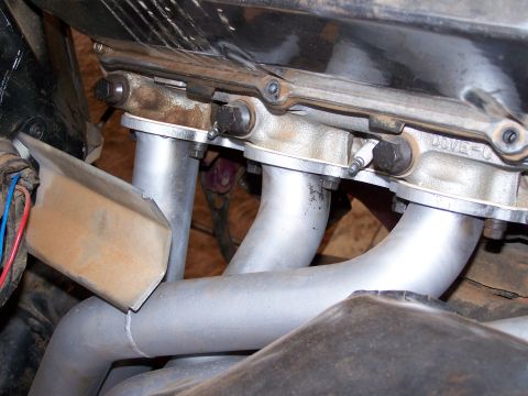 1995 Ford Bronco - Engine exhaust manifold pipes and related components are shown in detail.