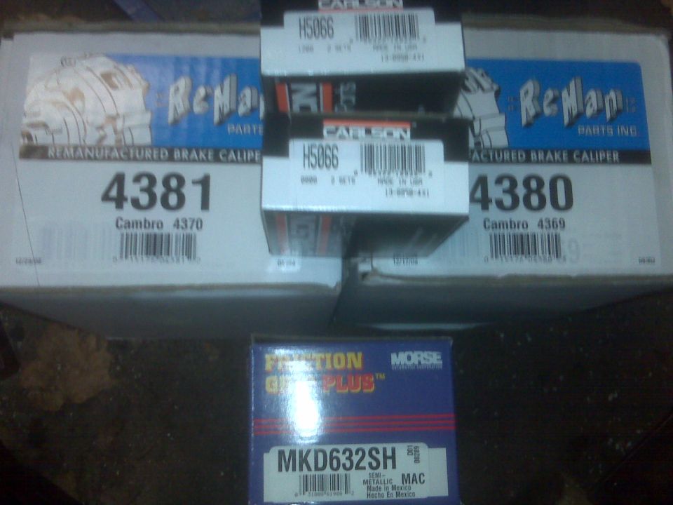 Boxes of Remanufactured Brake Calipers and a box of Morse brake pads