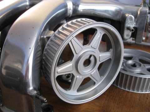 1994 Ford Probe - Close-up of engine components, including a polished pulley and toothed gears.