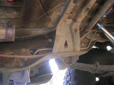1996 Ford Bronco - The rear suspension of a 1992 Ford Bronco, showing leaf springs and aftermarket shocks.