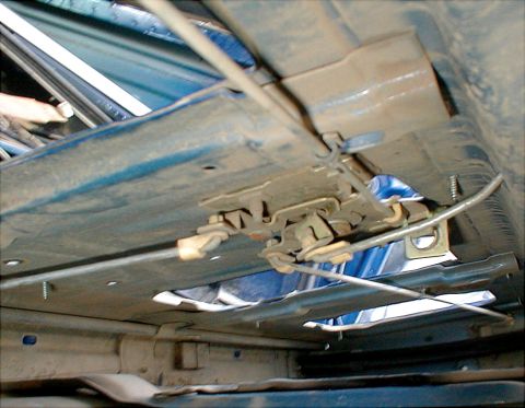 1983 Ford Bronco - The rod running to the Left (down) is the interlock rod that detects the glass being fully down. It is supported by a clip similar to the o…