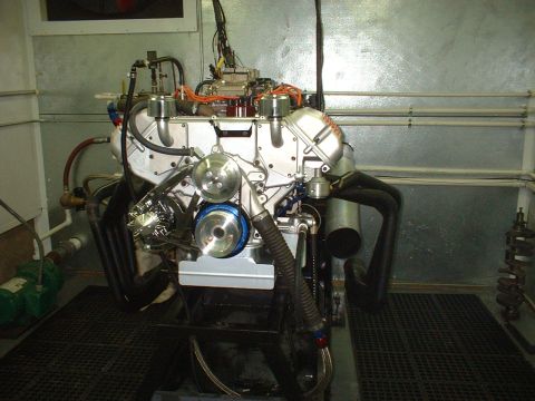 1970 Ford Mustang - Engine assembly mounted on a stand, ready for testing or display.