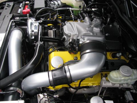 2003 Mercury Marauder - Custom engine bay modifications with yellow valve covers and aftermarket intake.