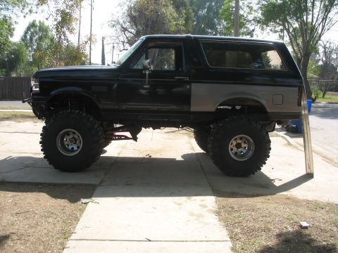 1987 Ford Bronco - This modified Ford Bronco appears to be from the 1992-1996 generation, not a 1987 model.