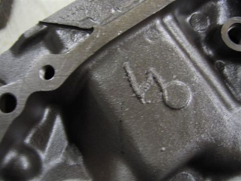 1972 Ford Ranchero - Cast metal engine component marked with V6. Album claims 1972 Ford Ranchero.