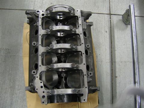 1972 Ford Ranchero - Engine block with crankshaft bearings visible, resting on cardboard.