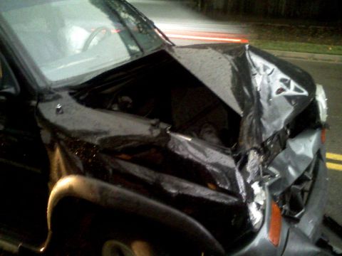1996 Ford Bronco - This vehicle sustained significant front-end damage, indicating a serious impact.