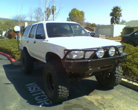 1993 Toyota 4Runner - This modified 1993 Toyota 4Runner features a custom front bumper and large off-road tires.