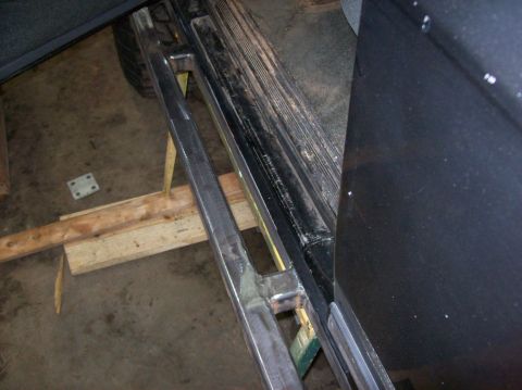 1992 Ford Bronco - Custom metal sliders are shown installed on the side of a vehicle, likely for off-road use or protection.