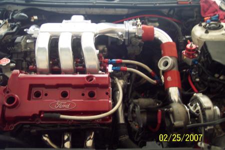 1994 Ford Probe - This image shows a modified Ford engine, likely with a turbocharger installed.