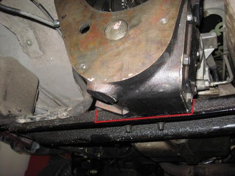1991 Ford Bronco - Underside view of a vehicle's transmission housing and frame, with a red outline indicating a specific mounting area.