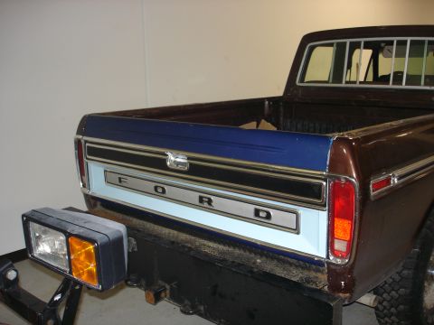 1979 Ford F-250 - Rear view of a 1979 Ford F-250 pickup truck, showing the tailgate and bumper.