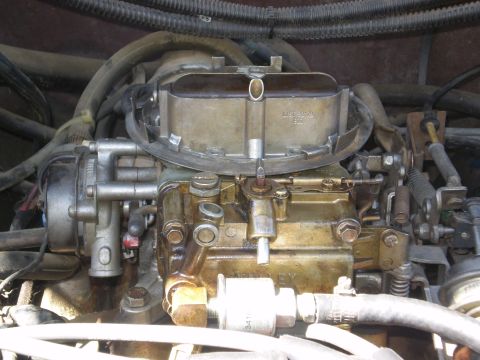1982 Ford Bronco - Engine carburetor detail shot.