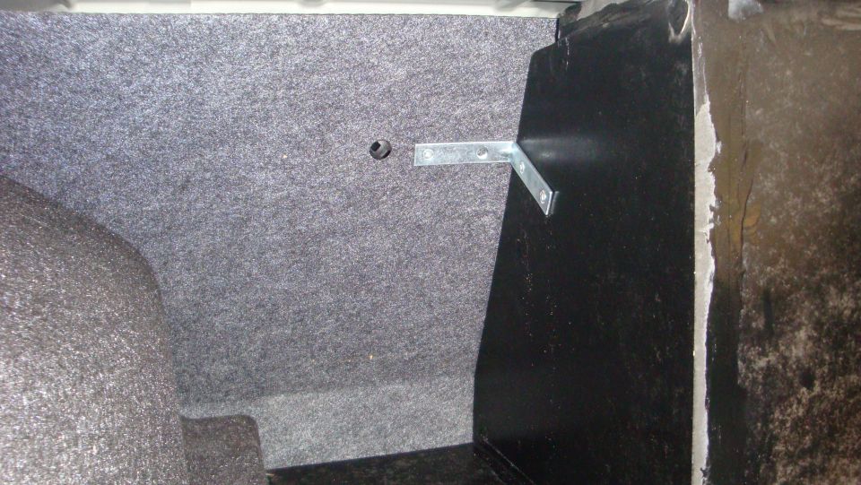 L bracket used to secure enclosure