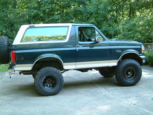 Side view of a 1993 Ford Bronco with large tires
