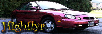 1998 Ford Taurus - A red 1998 Ford Taurus coupe is parked on a paved surface with trees and houses in the background.