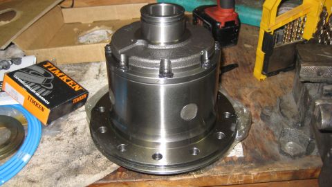 1978 Ford Bronco - A differential locker part sits next to a box of Timken tapered roller bearings.