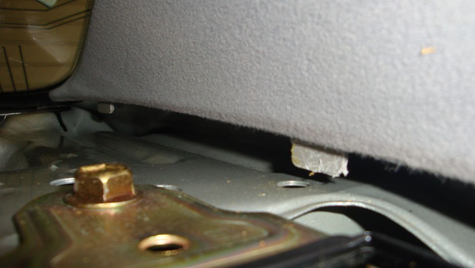 another close up of the tabs you have to get past to remove the deck lid