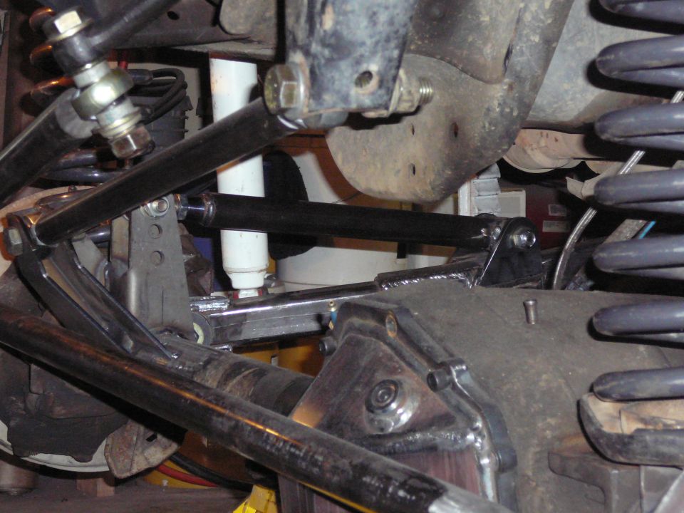 Close-up of heavy-duty suspension components and shocks