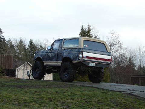 1991 Ford Bronco - This lifted 1991 Ford Bronco has a custom rear bumper and large off-road tires.