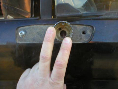 1983 Ford Bronco - With the gasket held by the rear screw and the original nut plate, set a hole saw over the support arm hole so it totally covers it, but do…