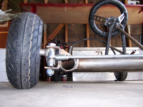 1991 Ford Bronco - Custom go-kart build showing steering mechanism and front wheel assembly.