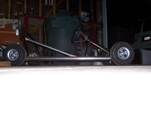 1991 Ford Bronco - A custom go-kart frame is shown in a garage setting, awaiting further construction.