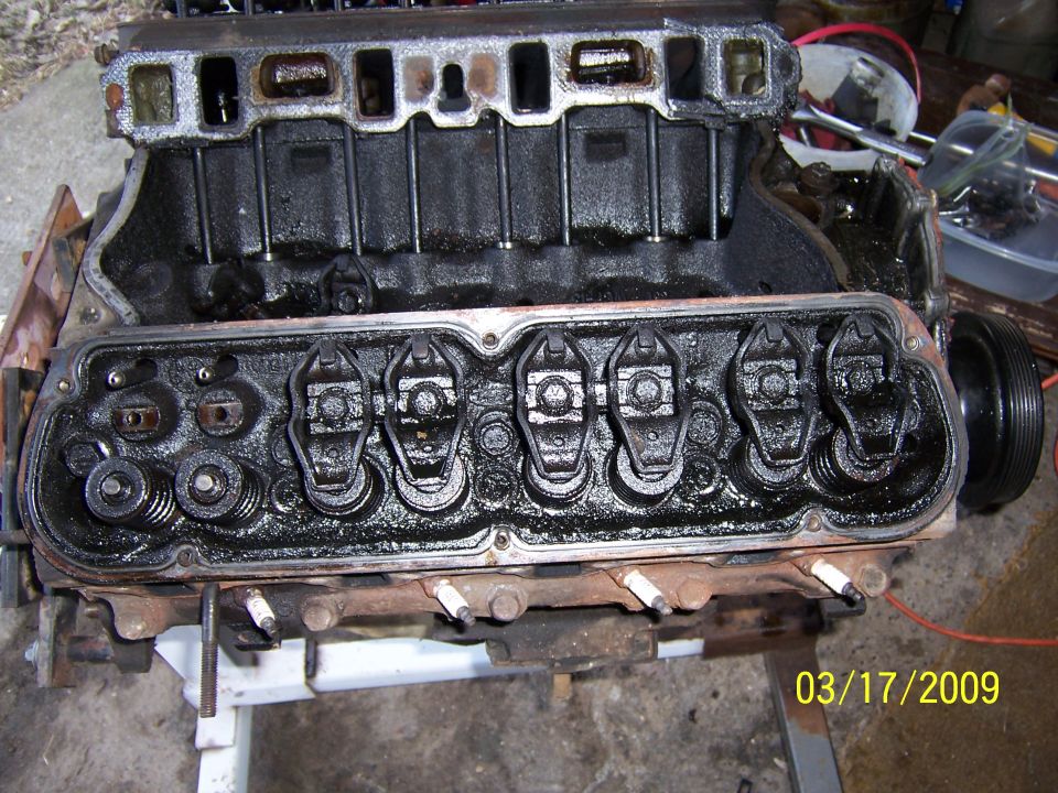 Engine block showing valve train components and spark plugs