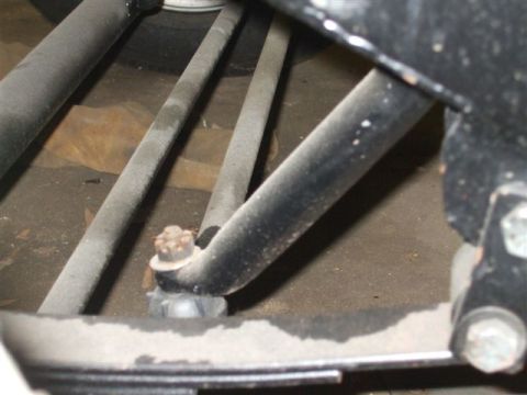 1963 Ford Galaxie - Undercarriage view of dusty vehicle suspension components, with visible text from Supermotors.net.