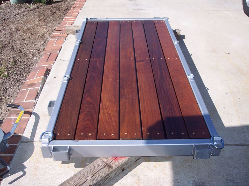 Wooden deck with metal frame on concrete